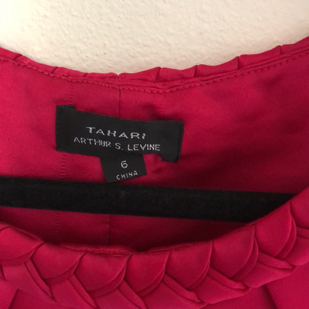 Designer dress, very classy, professional, and sexy all at once.